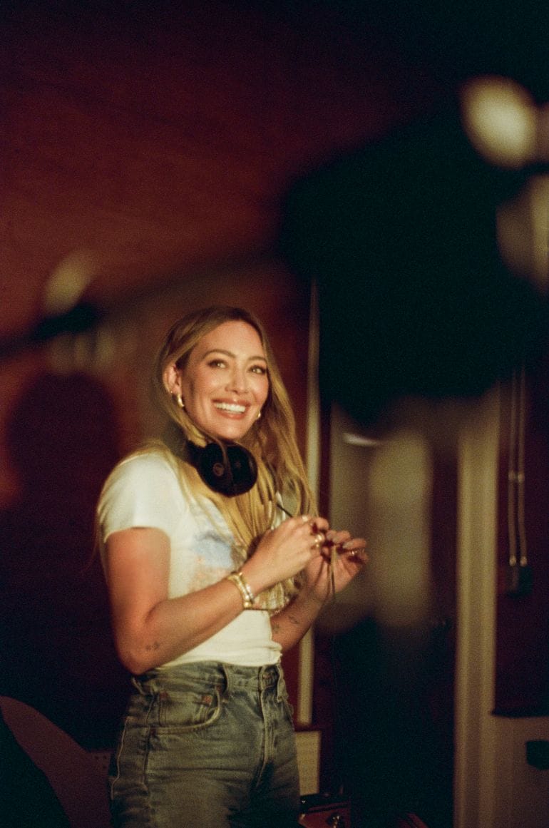 Hilary Duff signs with Atlantic Records for her highly anticipated return to music, with a docuseries capturing her journey.
