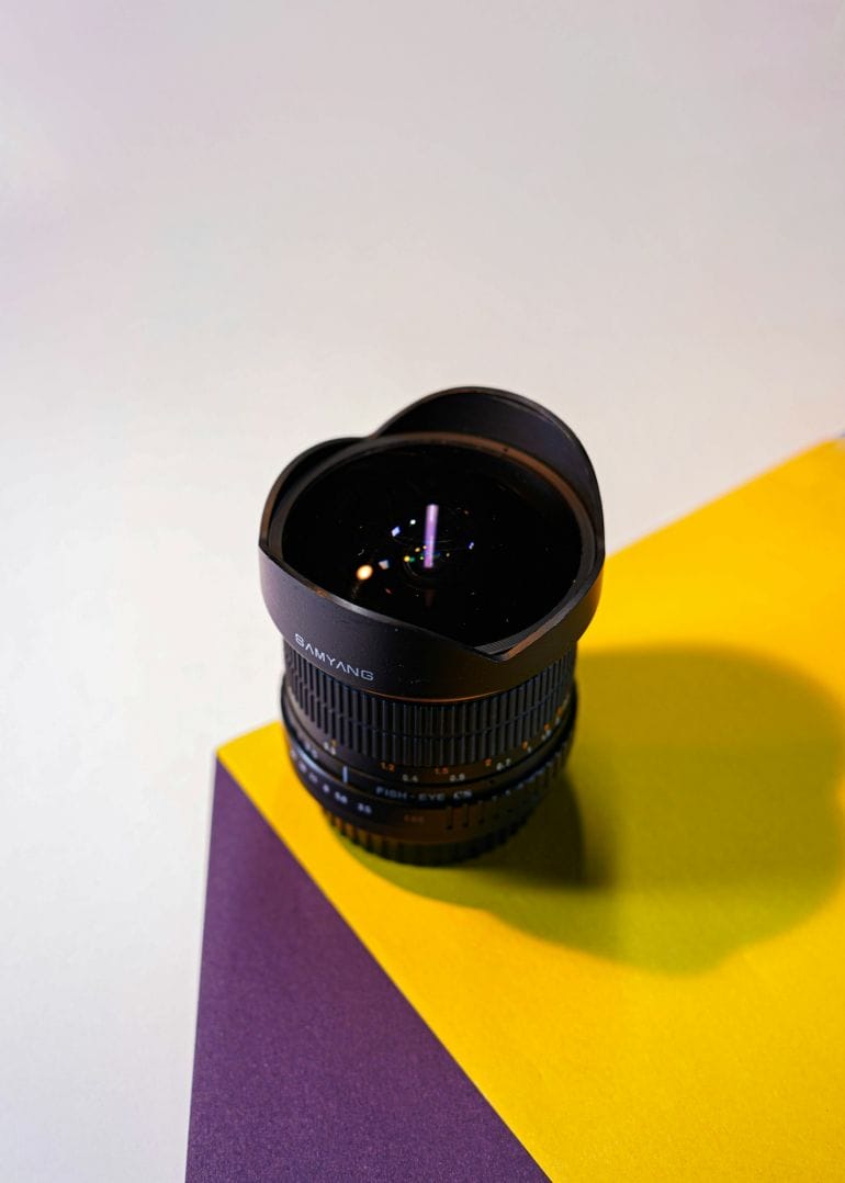 Fisheye camera lens on colorful blocks