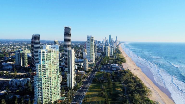 high rise buildings near sea during daytime