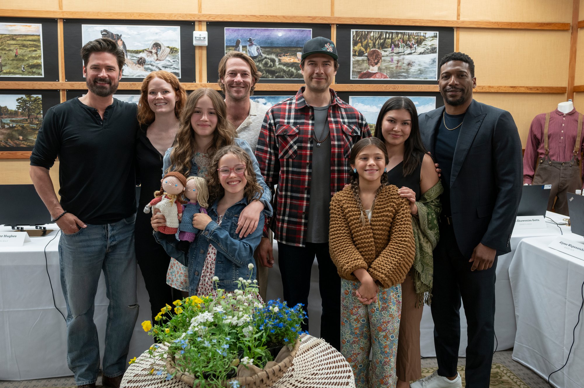 Little House on the Prairie. (L to R) Warren Christie as John Edwards, Crosby Fitzgerald as Caroline Ingalls, Skywalker Hughes as Mary Ingalls, Alice Halsey as Laura Ingalls, Luke Bracey as Charles Ingalls, Meegwun Fairbrother as Mitchell, Wren Zhawenim Gotts as Good Eagle, Alyssa Wapanatǎhk as White Sun, Jocko Sims as Dr. George Tann at the table read of Little House on the Prairie. Cr. Eric Zachanowich/Netflix © 2025