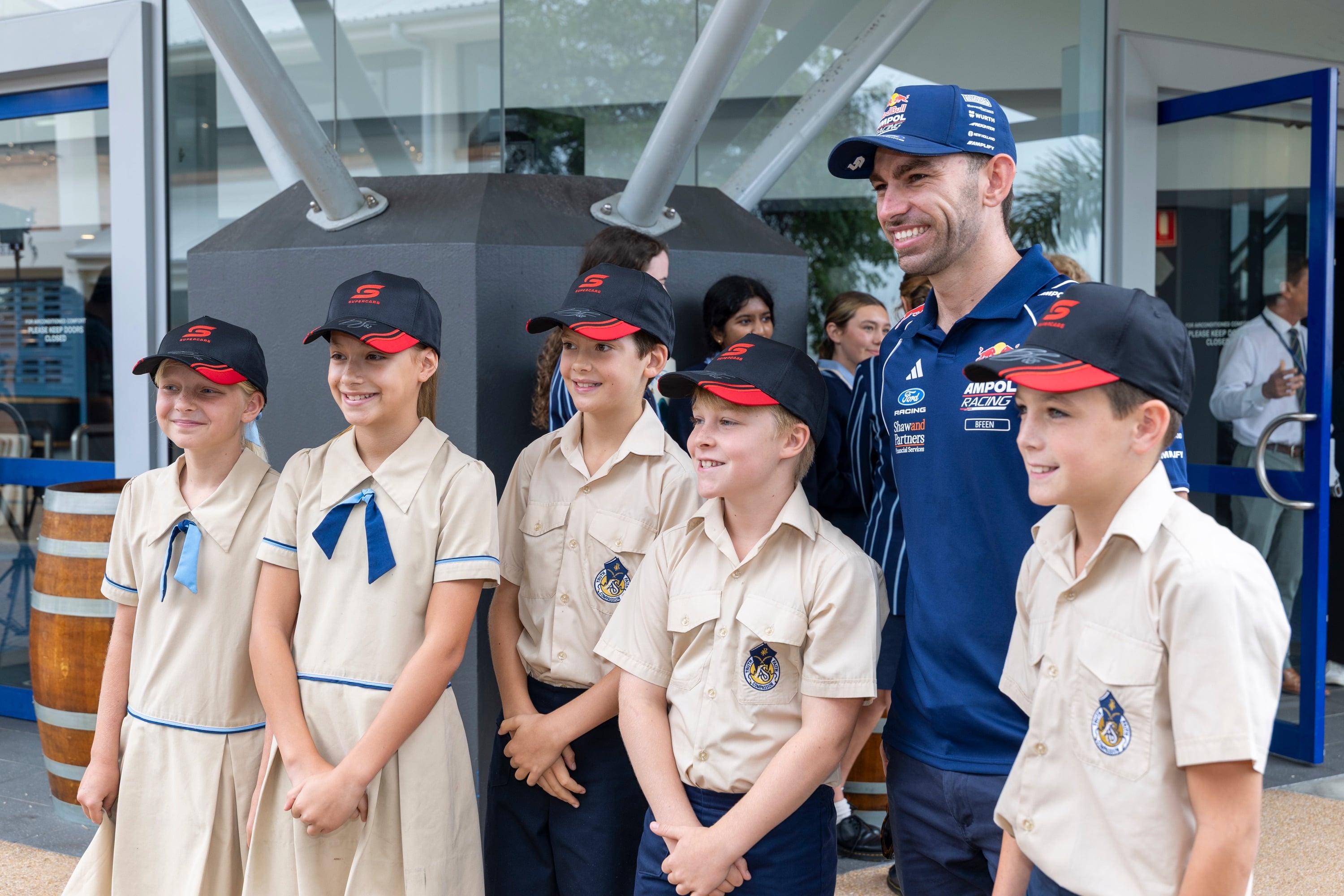 Broc Feeney visits All Saints Anglican School in Merrimac before racing commences at the Boost Mobile Gold Coast 500.